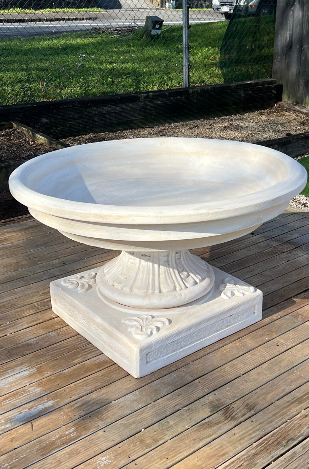 The Loire Planter from Faraway Garden is a stunning, large planter ideal for use as a focal point in the garden, or on a patio or terrace. It's elegantly moulded pedestal sits on a beautiful base with fleur de lis motif that gives extra stability and artistry.   It makes a wonderful planter in a more formal garden setting and is ideal planted in mass annuals or bulbs. It can also be used as a water feature with irises and fish.