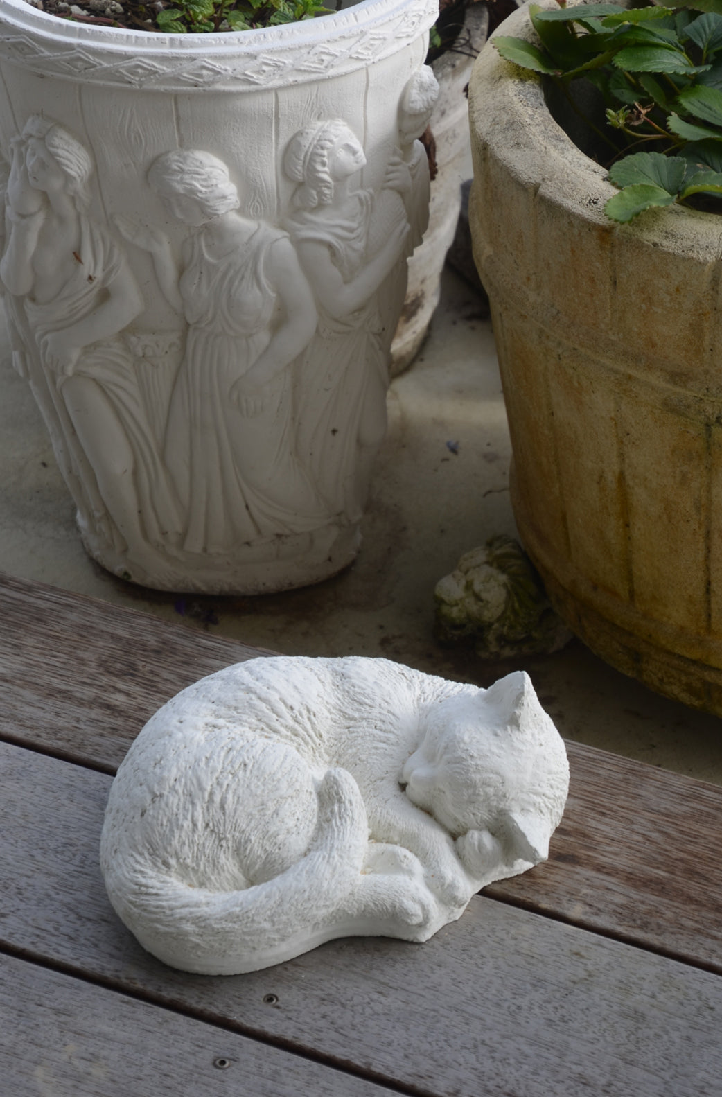 The Faraway Garden Sleepy Cat is a delightful statue of a cat curled up, fast asleep.  This statue would look wonderful nestled near a group of planters, on a patio or on a wall or paver in a kitchen garden. Choose sepia for an aged effect.  Over many years, statues have played a prominent role as focal points in gardens. From the most grand and ornate gardens with large figures, to small creatures in a naturalistic setting, statues bring life and surprise to a garden.