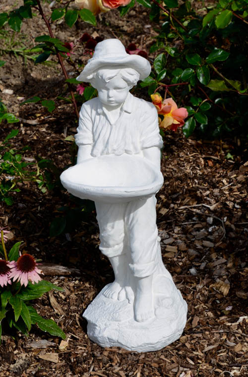 The Faraway Garden Beachcomber Boy is a small statue depicting a boy holding a shell. A delightful addition to any garden setting and also works as a great bird feeder or receptacle for finds from the seaside.