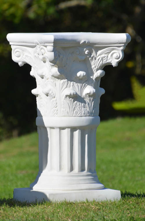 The Faraway Garden Corinthian Pedestal has a round fluted column following classical doric design, with elaborately moulded capital at the top and set upon a stacked, hexagonal base.  This impressive and beautifully detailed pedestal partners perfectly with many of our planters, urns and unique objects for the garden.
