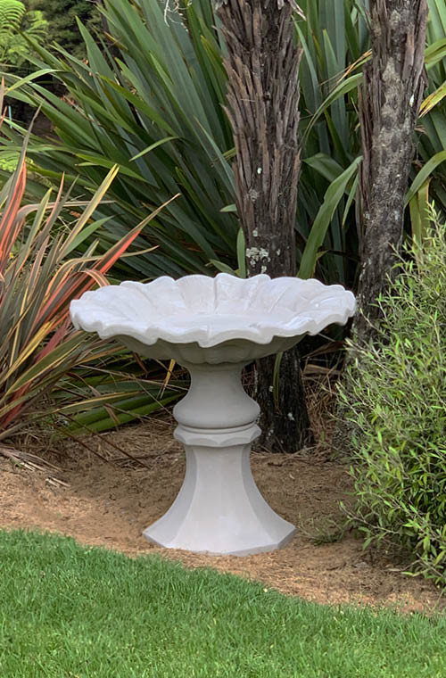 This impressive, elegant bird bath with its fluted pedestal and generous shaped bowl is a beautiful showpiece in any garden setting; from a more formal rose garden, at the end of the lawn; to a position nestled in a rambling herbaceous border.
