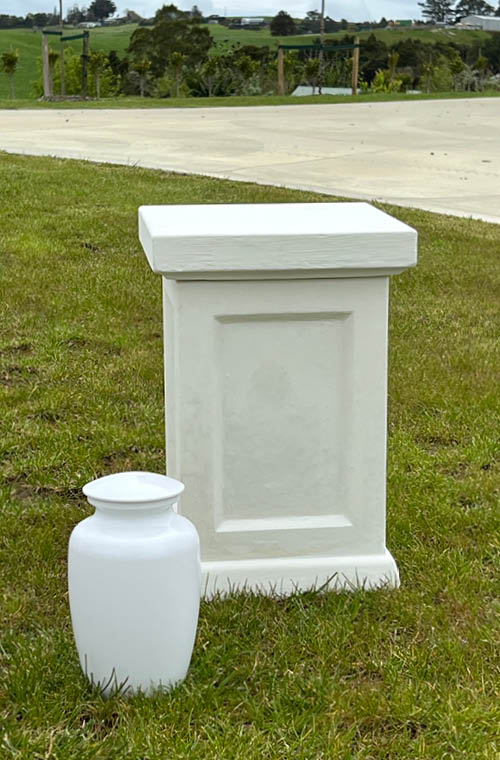 The Faraway Garden Auden Memorial Pedestal is a&nbsp;beautiful alternative to more traditional memorials. The Auden pedestal follows the classic proportions and fielded panel shaft of the Regency period. It discreetly homes a cremation urn and is capped for weatherproofness, protection and permanence.

Top the pedestal with one of our statues or a planter to create a more individual statement to commemorate the passing of a loved one. (Planters and statues sold separately.)