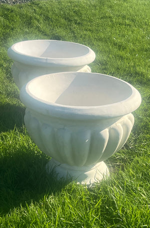 The Faraway Garden Calabria Urn is an elegant garden planter inspired by the classical aesthetic of Ancient Rome and popular in the Renaissance with its regular, ornamental curved moulding or gadrooning,&nbsp;reminiscent of flower petals.

This impressive garden planter would look gorgeous as part of a group or positioned on a Faraway Garden pedestal and the focal point at the end of pathway or the centrepiece of a rose garden. It can be sepia washed for an aged effect. Shown here in sepia on