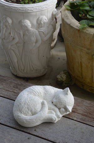 The Faraway Garden Sleepy Cat is a delightful statue of a cat curled up, fast asleep.  This statue would look wonderful nestled near a group of planters, on a patio or on a wall or paver in a kitchen garden. Choose sepia for an aged effect.  Over many years,&nbsp;statues have played a prominent role as focal points in gardens. From the most grand and ornate gardens with large figures, to small&nbsp;creatures in a naturalistic setting, statues bring life and&nbsp;surprise to a garden.