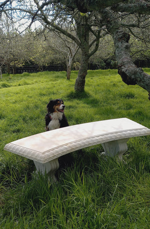 While away the hours on this beautiful, classically proportioned curved bench seat with decorative moulding on edge and scrolled seat supports.  A large and stunning garden seat to position at the end of a lawn, on a terrace or over looking a pond or view.  This is a three component bench that can be relocated, will weather wonderfully and stand the test of time. This seat looks great with a sepia wash for an aged aesthetic.