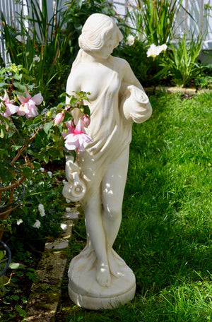 The Faraway Garden Daphne is a graceful garden statue depicting a nymph from Greek mythology who is associated with fountains, wells, springs, streams and other bodies of freshwater. She works wonderfully as a statue raised on a pedestal in a formal flower bed, a rose garden or nestled in an herbaceous bord