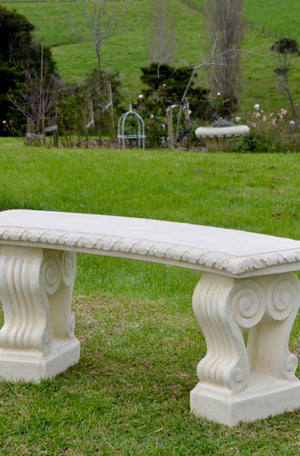 While away the hours on this beautiful, classically proportioned curved bench with intricate leaf moulding around the seat and scrolled legs.  A well placed bench is an invitation to explore a garden, a place to unwind and a place to view your garden from a different vantage point. A bench can be around a corner, hidden as a surprise or at the end of a lawn, on a terrace or beside a wall beneath a rambling old rose.  A wonderful three component bench that will stand the test of time.